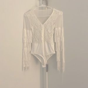 White body suit with fringe sleeves